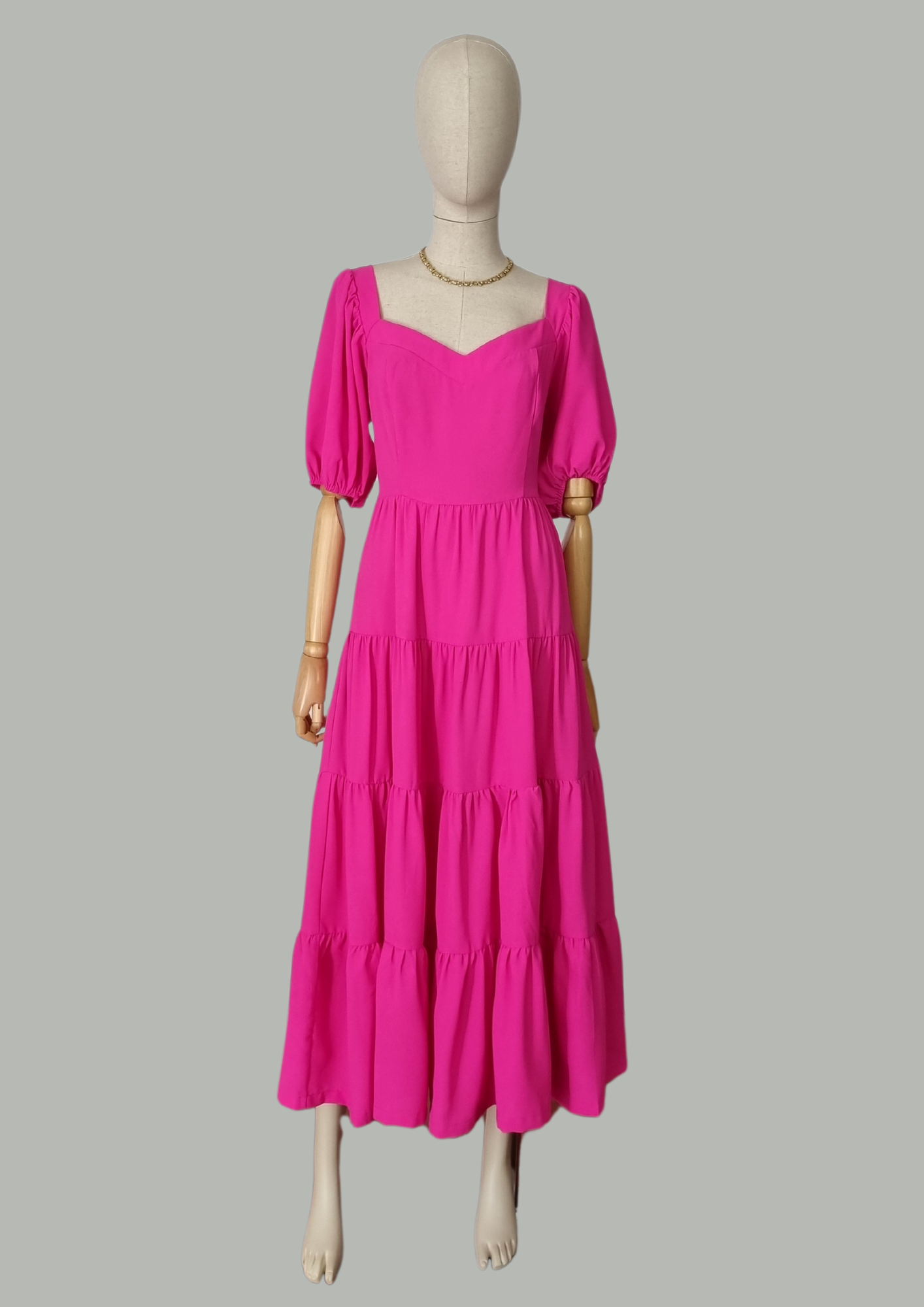 Vestido midi manga bombacha rosa Antora Boutique
