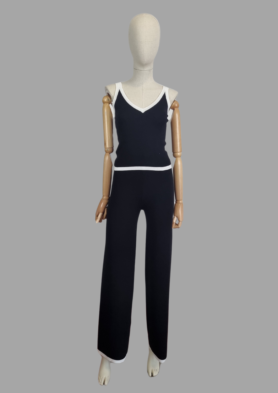 Set pantalon y blusa negro rayas blancas